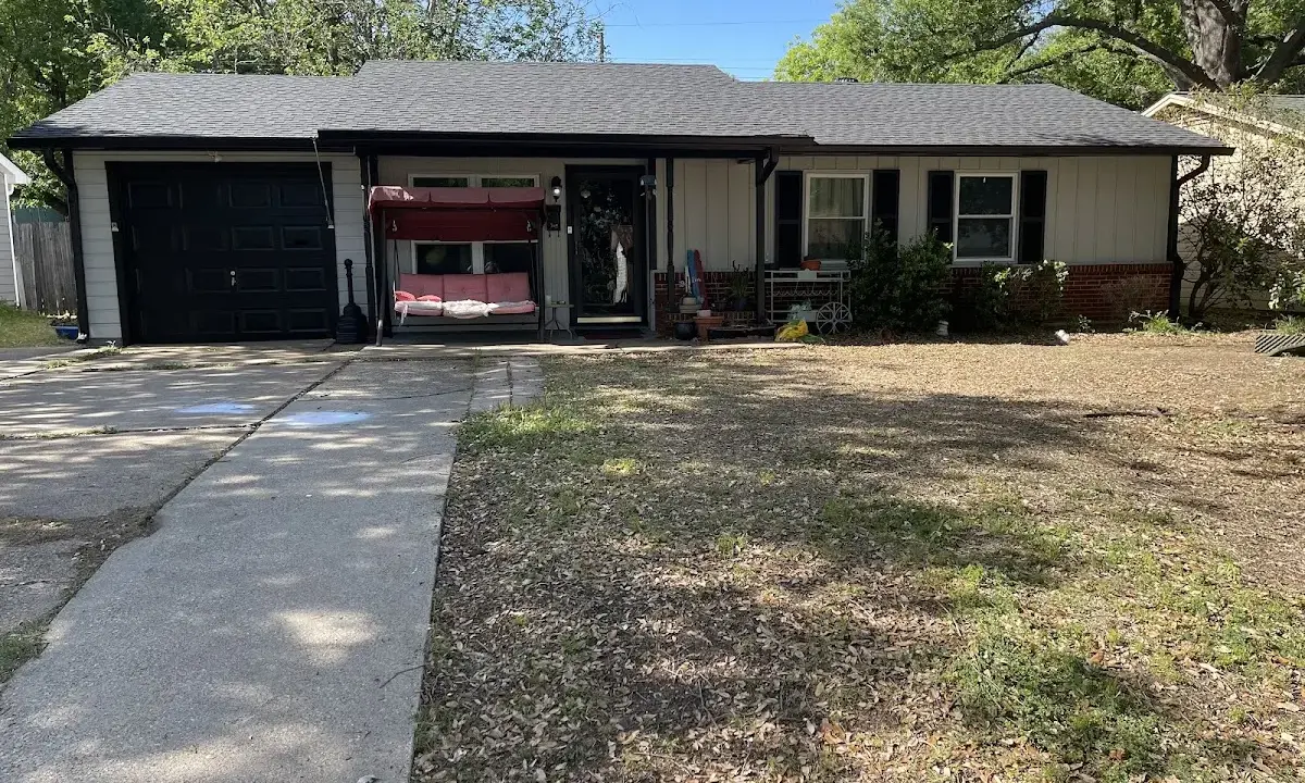 Asphalt Shingle Roof Repair crew at work on a residential roof in Gainesville